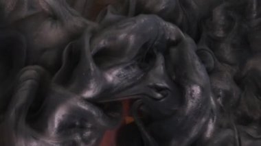 Xmas mücevheri. Yumuşak kaplama. Odaklanamayan koyu metalik sarı renk. Soyut sanat ışığı arkaplanındaki boya mürekkebi lekesi..