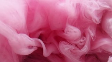 Pırıltılı sis. Mürekkep suyu karışımı. Pembe renk parıldayan parçacıklar dokusu duman sıçrayan dalgalar yüzen soyut sanat arkaplanı.