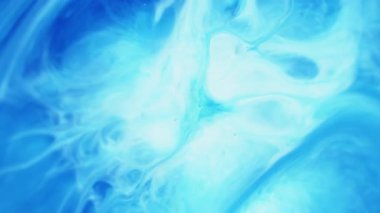 Akrilik boya. Mürekkep suyu. Bulanık mavi beyaz renkli dalga dokusu mermer karışımı soyut akrilik arka planda büyüyen parlak parçacıklar..