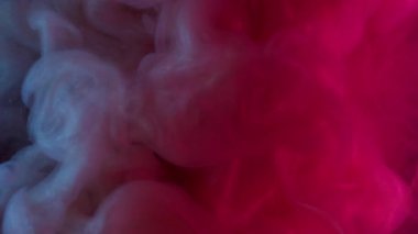 Mürekkep karışımı. Sis girdabı. Kırmızı gri pigment fantezi şekil dalga sualtı karışımı dökülüyor. Parlayan neon çözünmüş sanat soyut su arkaplanı.