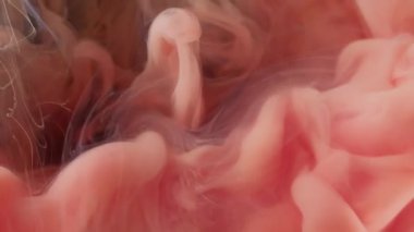 Buhar bulutu. Puf boyası. Şeftali rengi sanat sıvısında buhar akışı düşüyor. Odaklanmamış boya rengi pigment su soyut arkaplan.