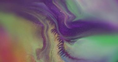 Renk karışımı. Parlak doku. Odaklanmamış mor yeşil boya soyut arkaplana yayılan parlak parçacıklar..