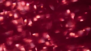 Disko kaleydoskobu. Bulanık renk flaşı. Parlak kırmızı desenli titreşimli mercek parıltısı modern soyut bokeh ışık arka planında hareket ediyor.