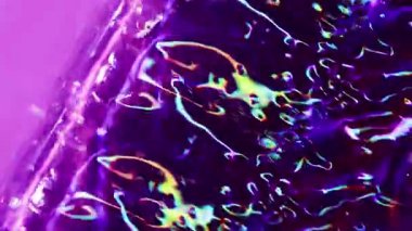 Floresan kaleydoskop. Bulanık neon sıçraması. Mor yeşil, mavi, kırmızı, bulanık ışık arkaplanı yanıp sönen çok renkli mercek mercekleri..