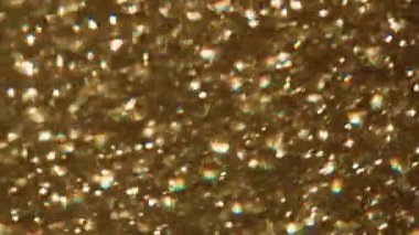 Parlak mercek parlaması. Bulanık sanat. Sarı, ışıl ışıl, optik kıvrım modern Bokeh ışığı soyut arka planında dönüyor..