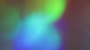 Odaklanamayan değişim. Bokeh ışığı. Çoklu renkli parlayan konfeti çemberleri parlıyor. Güneş ışığı aydınlatma günü yanma efekti arkaplanı.