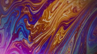 Akrilik emülsiyon. Mürekkep dök. Özgün, mor, kahverengi, neon damlacıklar soyut, yaratıcı ışık arka planında yüzen yuvarlak dokular..