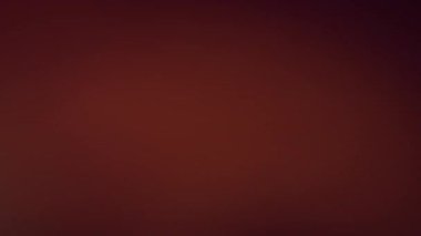 Fişekler bulanıklaşıyor. Film yanığı. Kahverengi arka planda parlayan renkli odaklanmış nokta. Gece soyut sinematik doku optik etkisini örtüyor.