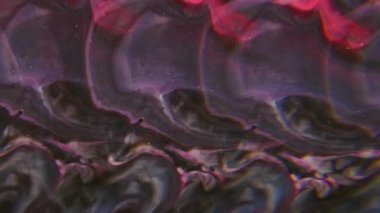 Fraktal akış mürekkebi. Sanat sıvısı bulanıklığı. Kırmızı mor siyah akrilik karışım rengi. Parlak boya kıvrımlı gece dalgası soyut arkaplanı çözdü.