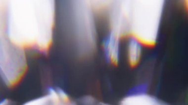 Işıl ışıl. Bulanık parıltı. Odaklanmamış mavi turuncu rengin yanıp sönmesi soyut arkaplanda yüzen optik yansıma.