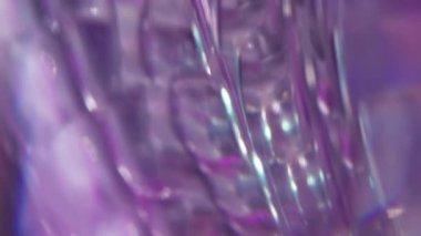 Bokeh ışıl ışıl. Bulanık yüz dokusu. Odaklanmamış mor mavi renk spektrumu mercek soyut sanat ışığı arka planında yanıp sönüyor.