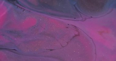 Parlak sıvı. Arkaplanı boya. Bulanık pembe mavi renk su lekeleri kabarcıklar soyut soyutlama üzerinde yüzen parçacıklar..