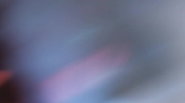 Parlak lens. Bulanık parıltı. Soyut kristal sanat arka planında sönük sarı mavi çok renkli pırıltılı ışıltı dokusu.