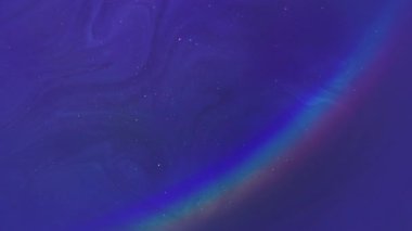 İşaret fişeği. Akış dalgası sanatı. Odaklanmamış mavi neon yeşil renkli kimyasal gökkuşağı simli sıvı damla soyut yaratıcı akrilik arka planda yüzer..