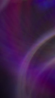 Dikey video. Çok renkli flaşlar. Odaklanamayan parlayan daireler çiziyor. Parlak parçacıklar modern bulanık bokeh kara arkaplan üzerinde hareket ediyorlar.