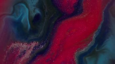 Bulanık akrilik sıvı. Parlak mürekkep. Odaklanmamış kırmızı, kırmızı, renkli su, parlak doku sıvısı soyut sanat arka planında akıyor..