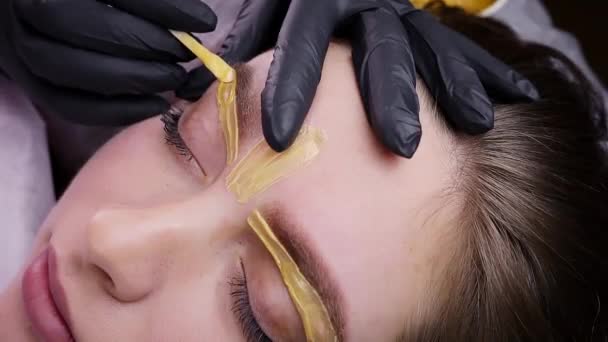 Застосування Жовто Коричневого Воску Нижнього Контуру Брів Видалення Волосся Перманентна — стокове відео
