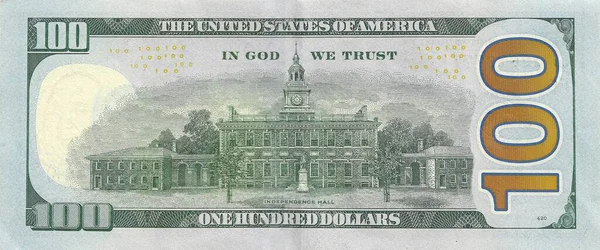 Amerikan ekonomisini temsil eden 100 dolarlık fatura, refah ve ekonomik özgürlüğün sembolü.