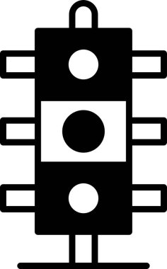 Kırmızı ışığı ve yeşil ışığı olan bir trafik ışığı.