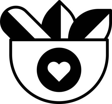 Üzerinde kalp olan bir kase ve bir sürü yaprak.