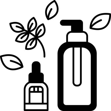 Üzerinde yaprak olan bir şişe sıvı.