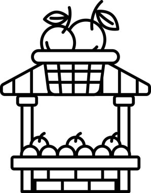 Üstünde meyve sepeti olan bir meyve standı.