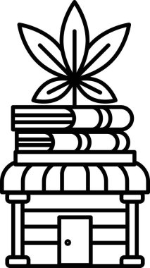 Üstünde bitki olan bir bina.