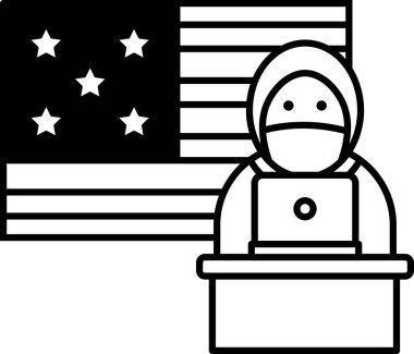 Maskeli bir adam masasında Amerikan bayrağının önünde oturuyor. Yalnızlık ve yalnızlık kavramı, çünkü adam çalışma alanında yalnız.