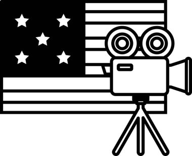 Bir Amerikan bayrağının önüne bir kamera yerleştirildi. Kamera bir tripodun üzerinde ve bayrağa doğrultulmuş. Bayrak siyah ve beyaz.