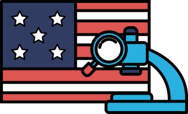 Bir Amerikan bayrağının üzerine bir mikroskop yerleştirilir. Mikroskop mavi ve beyaz.