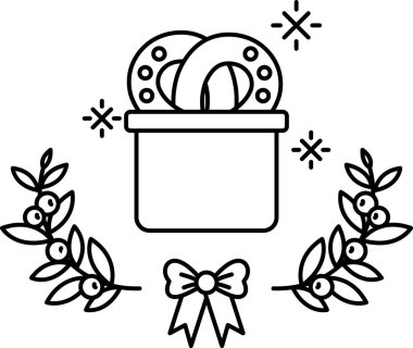 Üstünde at nalı olan bir sepet resmi. At nalı yapraklardan bir çelenkle çevrilidir.