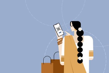 Alışveriş yaparken ödeme yapmak için akıllı bir telefondaki QR kodunu kullanan bir kadının resmi