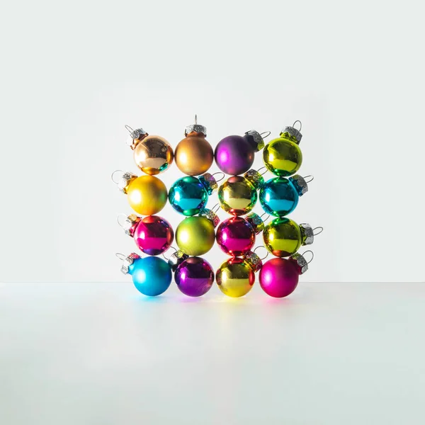 Christmas Ornaments Balancing Light Background Minimalistic New Year Concept Creative — Stock Photo, Image