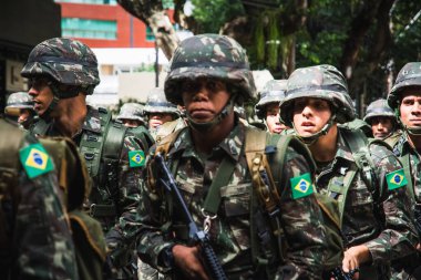 Salvador, Bahia, Brazil - September 07, 2016: Young army soldiers marching on Brazilian independence day in the city of Salvador, Bahia. clipart