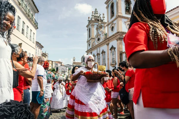 stock image Salvador, Bahia, Brazil - December 04, 2022: Devout Catholics of Santa Barbara carry gifts to the saint. Pelourinho, Salvador, Bahia.