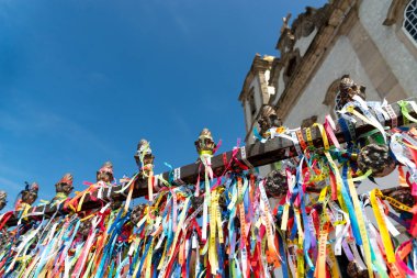 Salvador, Bahia, Brazil - January 06, 2023: Grille of the Catholic Church of Senhor do Bonfim decorated with colored ribbons. City of Salvador, Bahia.