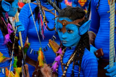 Maragogipe, Bahia, Brazil - February 27, 2017: Family dressed as avatars are seen during the carnival parade in the city of Maragojipe, Bahia.