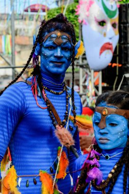 Maragogipe, Bahia, Brazil - February 27, 2017: Family dressed as avatars are seen during the carnival parade in the city of Maragojipe, Bahia.