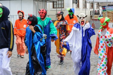 Maragogipe, Bahia, Brazil - February 27, 2017: Group of people parading dressed in horror costumes at the carnival in Maragojipe, Bahia.