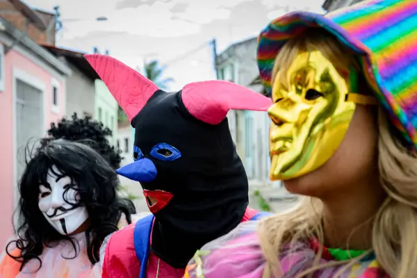 Maragogipe, Bahia, Brazil - February 27, 2017: People wearing venice carnival style costumes during parties in the city of Maragogipe, Bahia.