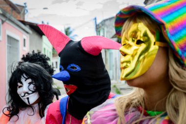 Maragogipe, Bahia, Brazil - February 27, 2017: People wearing venice carnival style costumes during parties in the city of Maragogipe, Bahia.