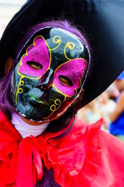 Maragogipe, Bahia, Brazil - February 27, 2017: People dressed up in Venice carnival style have fun dressed up during the carnival in the city of Maragogipe in Bahia.