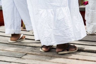 Lower part of Candomble faithful at the feast of Iemanja, in the city of Cachoeira, Bahia.