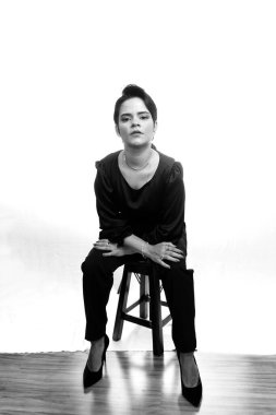 Black and white portrait of beautiful business woman. Isolated against white background.