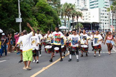 Salvador, Bahia, Brazil - February 11, 2023: Group of musicians play percussion during the Fuzue carnival parade in Salvador, Bahia.