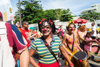 Salvador, Bahia, Brazil - February 11, 2023: Circus performers are seen during the pre-Carnival Fuzue parade in the city of Salvador, Bahia.