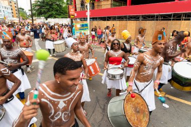 Salvador, Bahia, Brazil - February 11, 2023: Group of percussionists play during the Fuzue parade, at the carnival in the city of Salvador, Bahia.