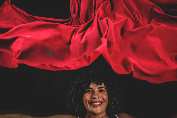 Portrait Woman Manipulating Red Cloth Isolated Black Background — Foto de Stock