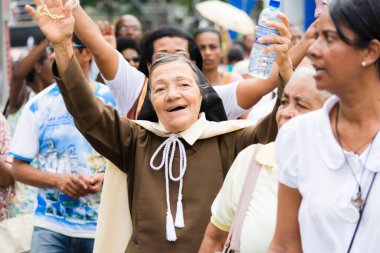 Salvador, Bahia, Brazil - May 26, 2016: Joyful Catholics participate in the Corpus Christi procession in Salvador, Bahia.