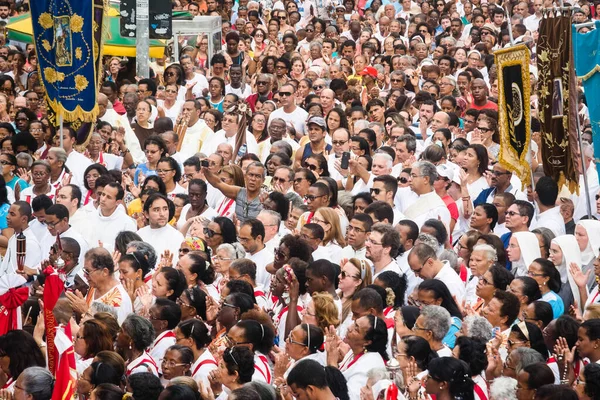 Salvador, Bahia, Brazil - May 26, 2016: Hundreds of Catholic faithful attend the Corpus Christi outdoor mass in Salvador, Bahia.